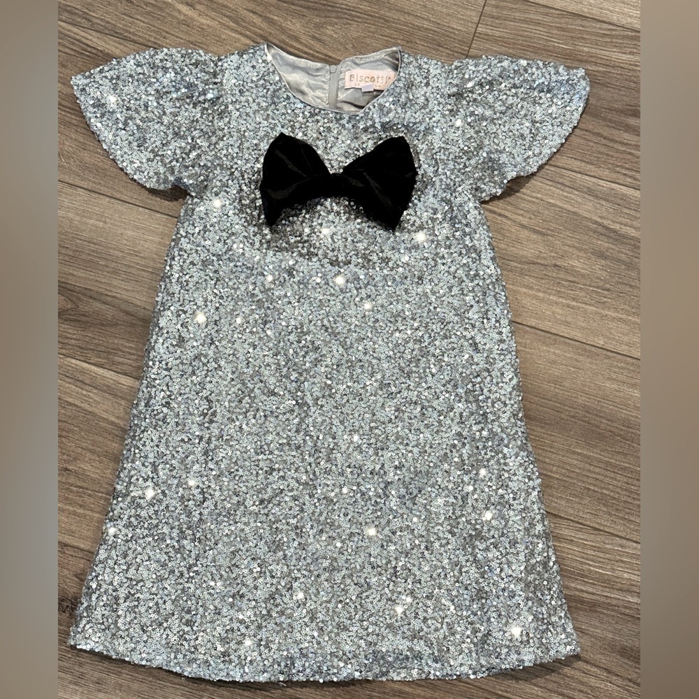 Biscotti Girls 7 Glittering Silver Dress with Black Velvet Bow